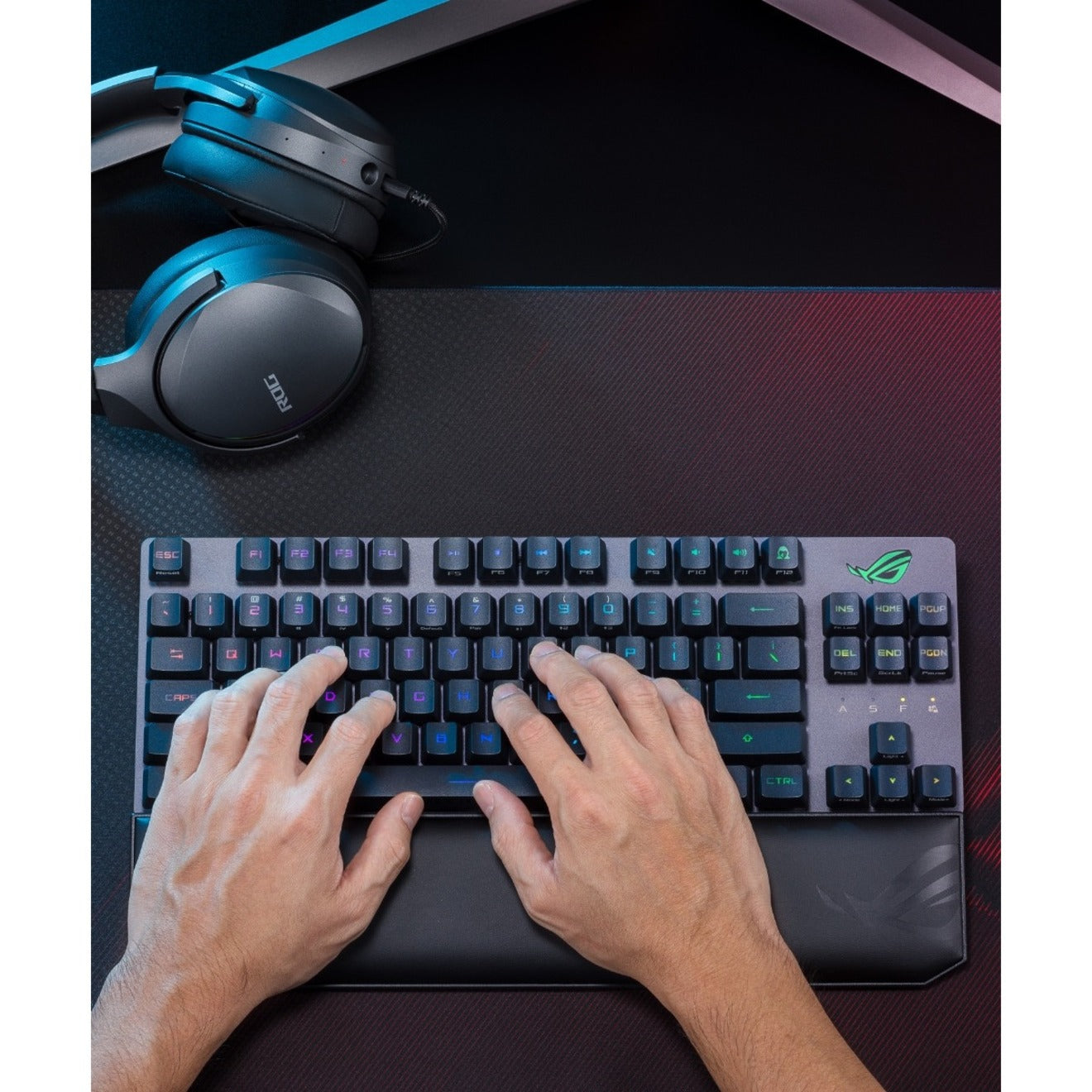 Hands positioned on ROG Strix Scope RX TKL Wireless keyboard showing ergonomic typing position-alternate-image12