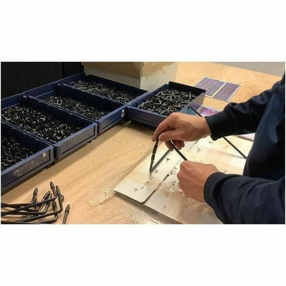 Manufacturing process of R-Go laptop stand showing component organization and assembly-alternate-image2