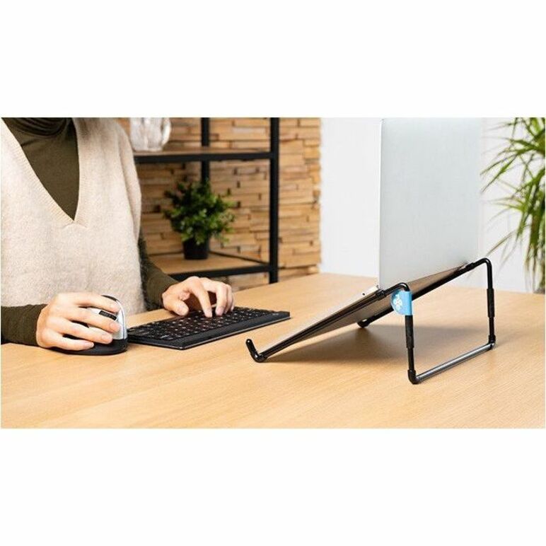 Person using laptop on R-Go stand in modern office setting showing practical workspace integration-alternate-image5