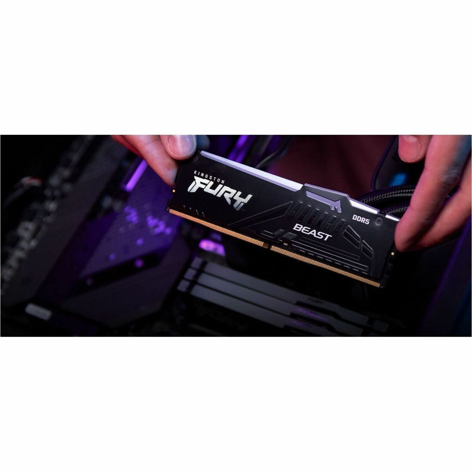 Hand installing Kingston FURY Beast DDR5 RAM module into motherboard