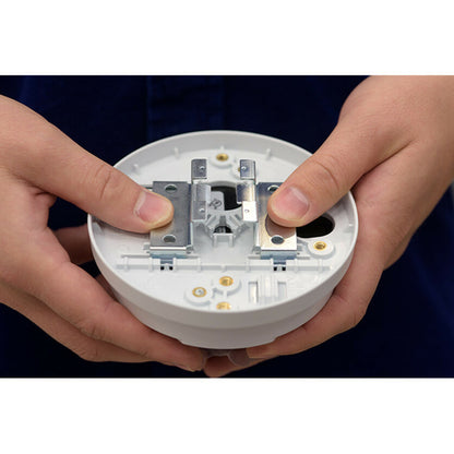 Close-up view of AXIS T91A23 mount's camera connection interface being handled-alternate-image2