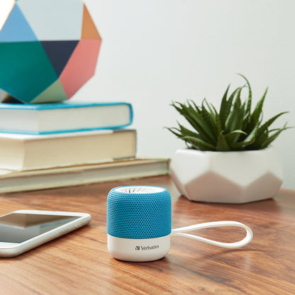 Verbatim Mini Bluetooth Speaker on wooden desk with smartphone, books, and decorative items-alternate-image4