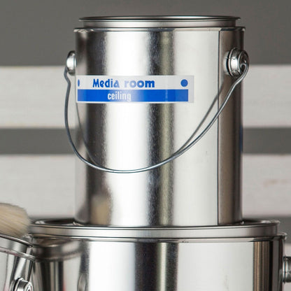 Brother P-touch label applied to a metal paint container showing durability in workshop environment-alternate-image8